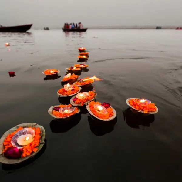 Candles floating in the Ganges River, Varanasi, India