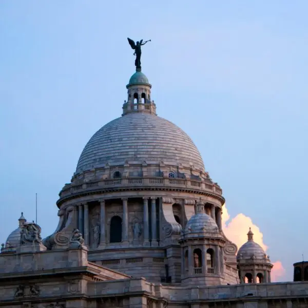 Historic Victoria Memorial architectural monument and museum at sunset. Kolkata, India.