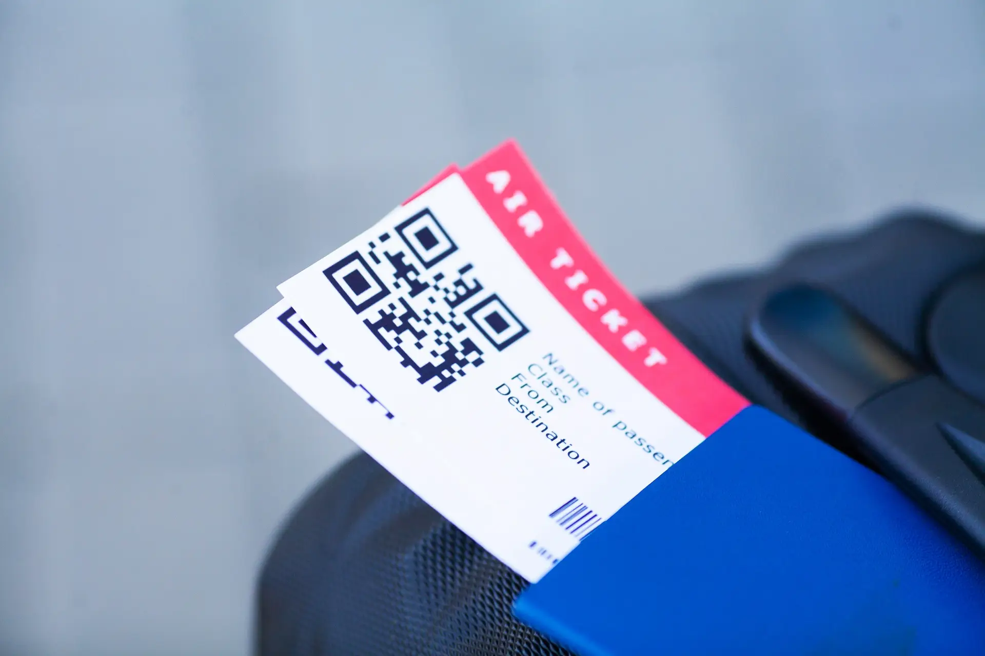 Close up two air ticket in abroad passport near airport