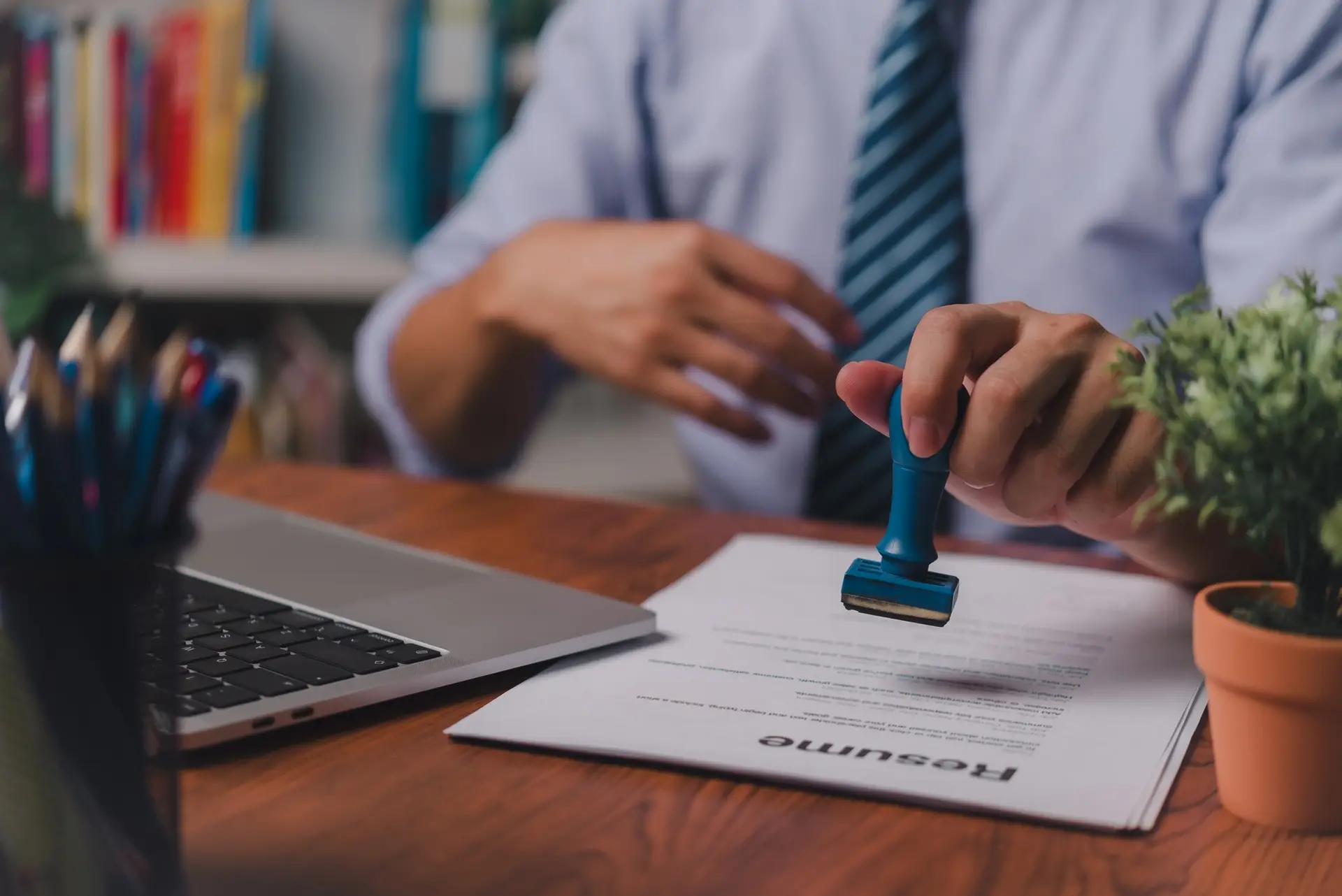 Hand Stamping document resume approve contract paper notary office visa work