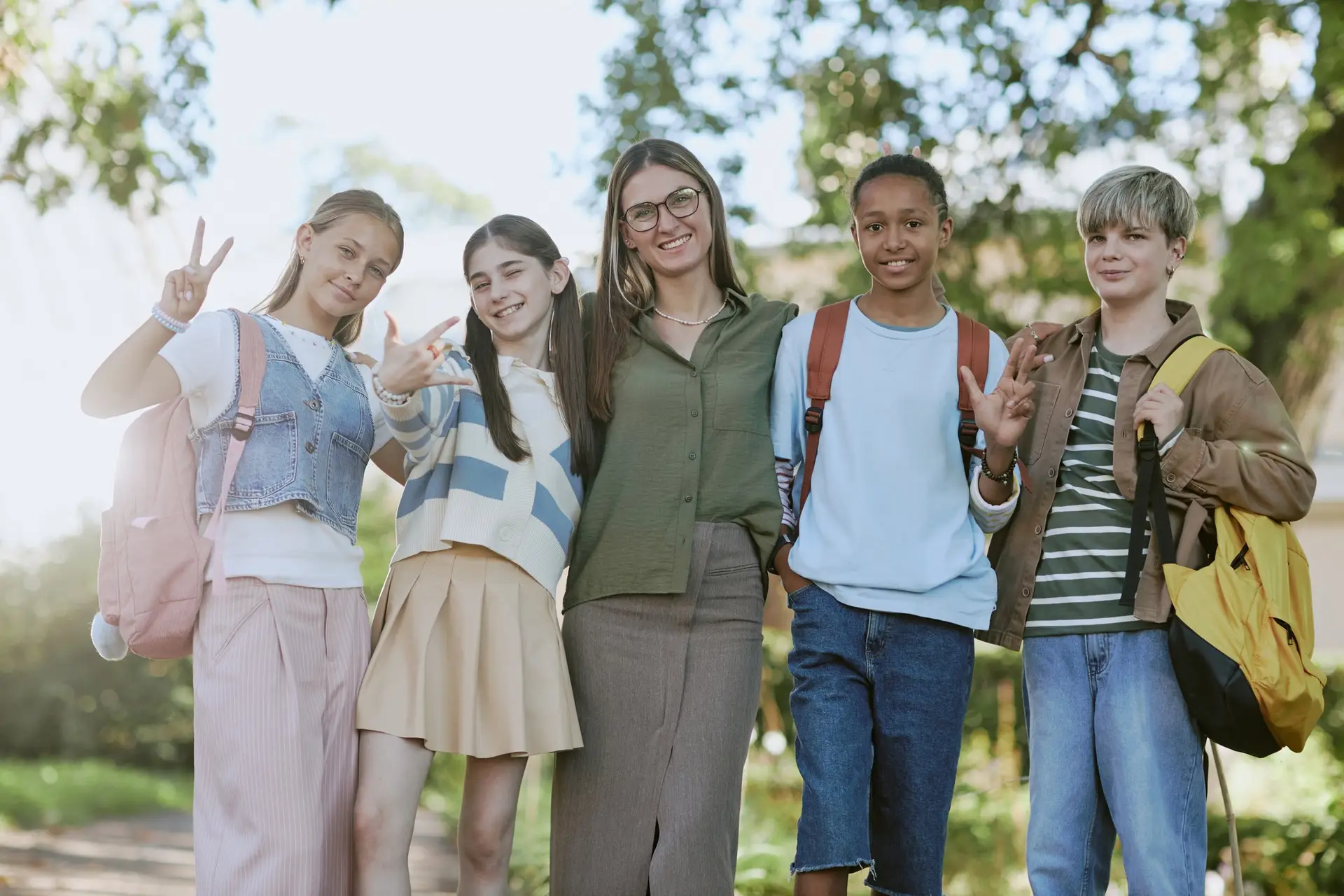 Tour Guide And Teenagers Group Portrait
